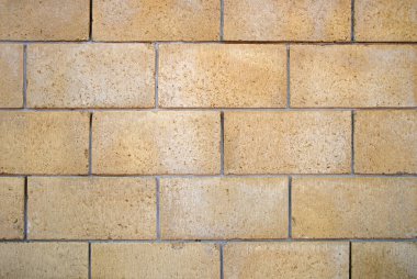 Makro detay yaş tarihi sanat tarzını kapat. Kil tanecikli çit çizgisi sembolü dizaynı. Açık rustik grungy kirli parlak bej kahverengi renk Gözenekli crack granit yazı tahtası etkisi metin alanı görünümü