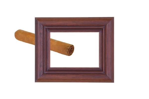 Деревянная рамка и сигара — стоковое фото