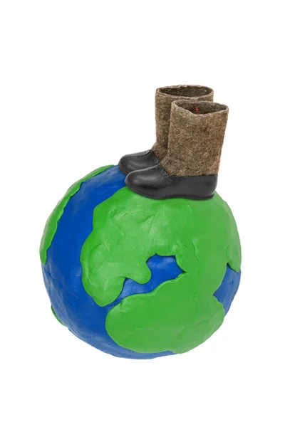 Globe en plastique et bottes en feutre — Photo
