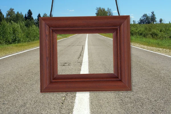 Wooden frame on the background of the road — Stock Photo, Image