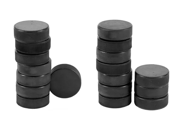 Stack av hockey puckar — Stockfoto