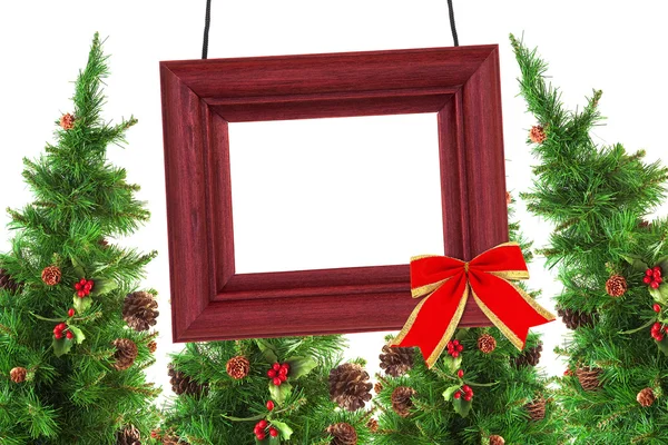 Photographic frame and Christmas trees — Stock Photo, Image