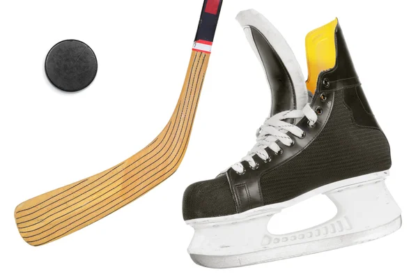 Hockeyskridskor, klubba och puck — Stockfoto