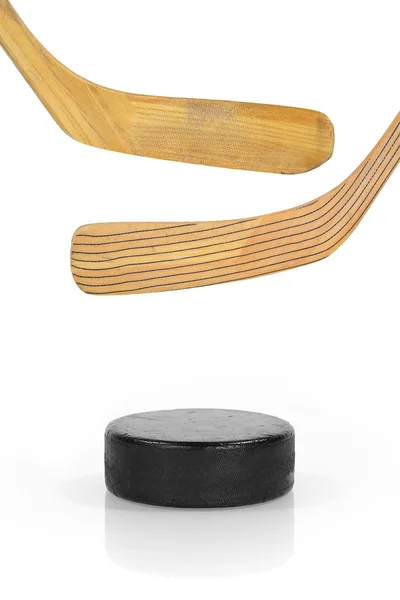 Hockey stick and puck — Stock Photo, Image