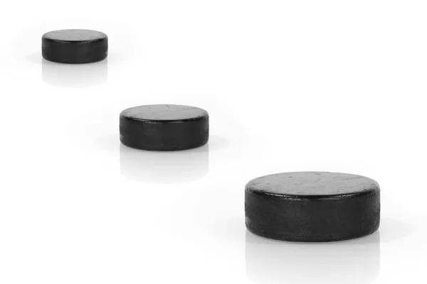 Three hockey puck — Stock Photo, Image