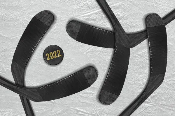 Hockey gloves, stick and puck on the ice rink. Concept, hockey, wallpaper