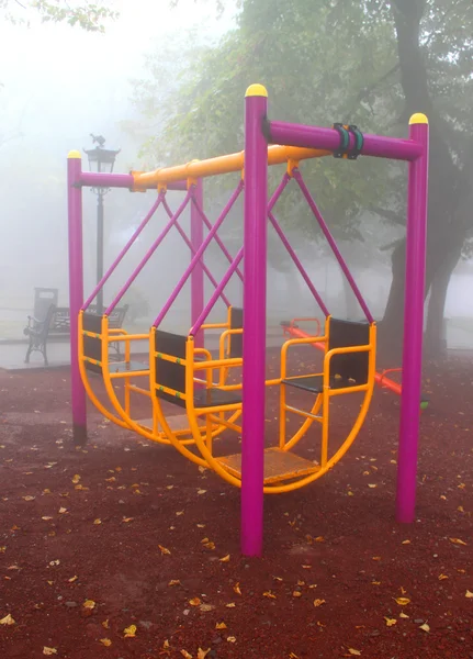 Playground in fog — Stock Photo, Image