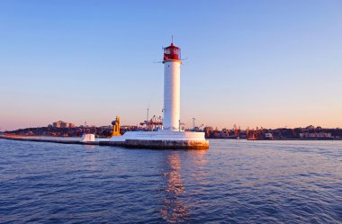 Operating lighthouse in Odessa in the evening. Ukraine. Black se clipart
