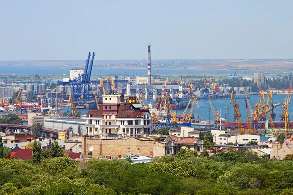 Cargo crane and grain dryer in port Odessa, Ukraine Royalty Free Stock Photos