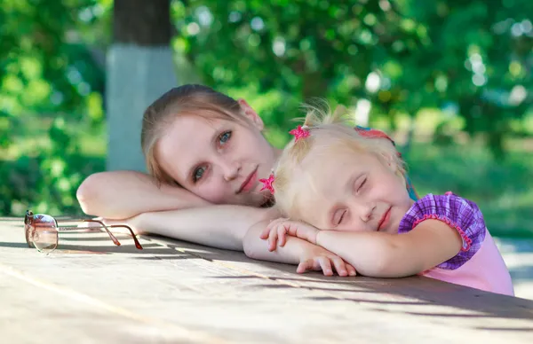 Beautiful young mother and her daughter — Stock Photo, Image