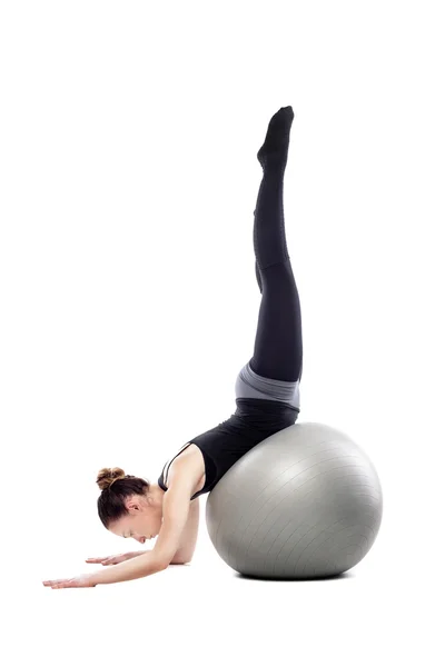 Mujer caucásica haciendo ejercicio pilates — Foto de Stock