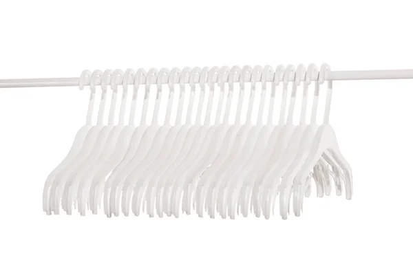 White Plastic Hangers Clothes Hanging Rod Clothing Rack Isolated White — Stock Photo, Image