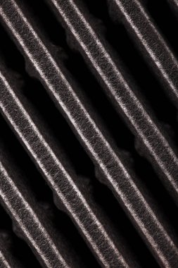 Air filter for vehicles abstract close up texture background. Car maintenance replacement part.