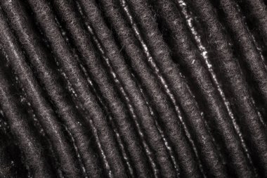 Air filter for vehicles abstract close up texture background. Car maintenance replacement part.