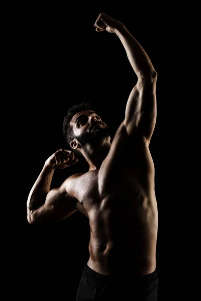 Side Lit Muscular Caucasian Man Silhouette Athlete Posing Black Background — Stock Photo, Image