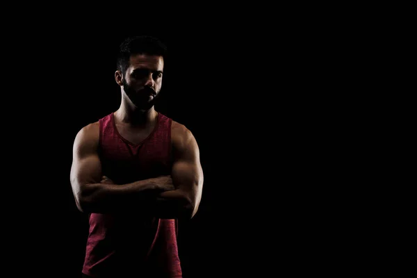 Side Lit Muscular Caucasian Man Silhouette Athlete Red Shirt Posing — Stock Photo, Image