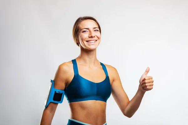 Portrait Girl Sports Outfit Making Thumbs Gesture Female Runner Gray — Stockfoto