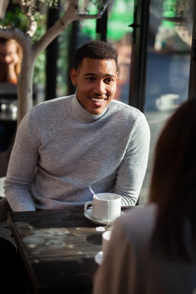 Two Friends Restaurant Talking Smiling Drinking Tea Multuracial Business Colleagues ロイヤリティフリーのストック画像