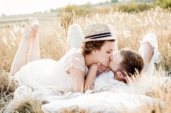 Happy couple embracing and laughing — Stock Photo, Image