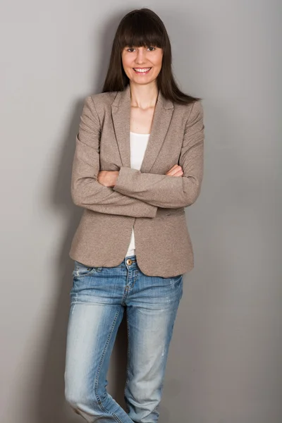 Gorgeous young female smiling confidently — Stock Photo, Image