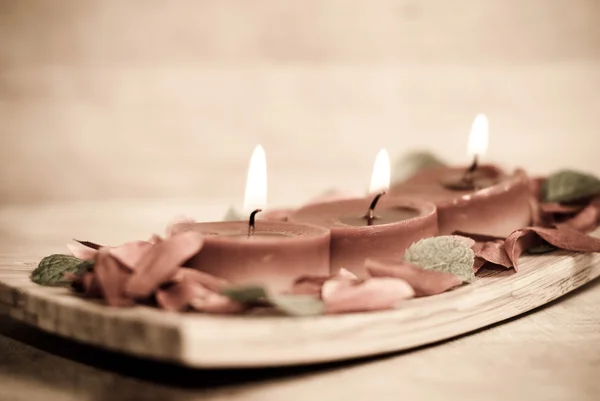 Red candles in spa salon — Stock Photo, Image