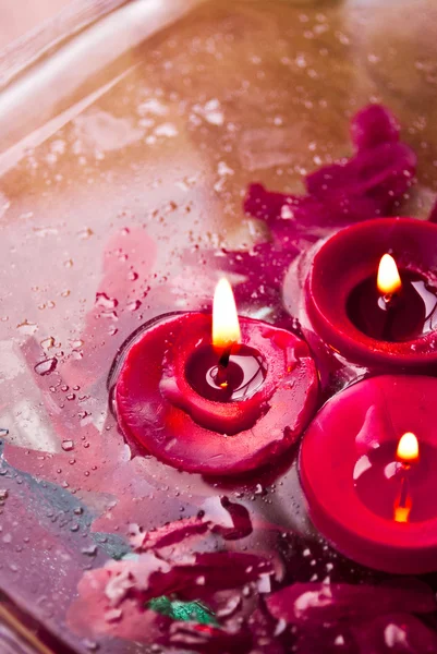 Red candles in spa salon — Stock Photo, Image