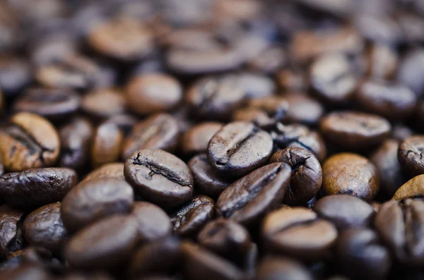 Brunt kaffe, bakgrundskonsistens, närbild — Stockfoto