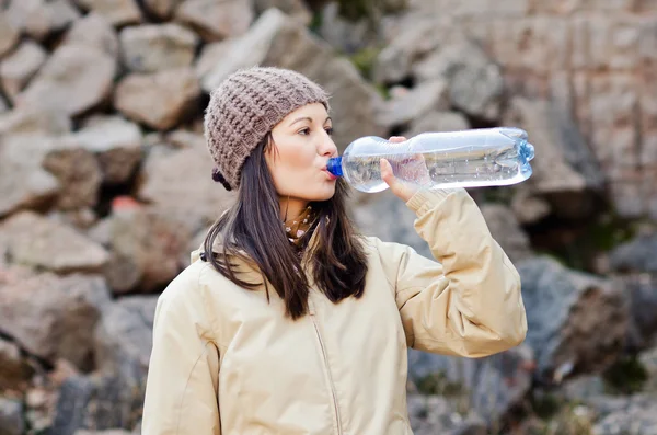 Young woman drinking — Stock Photo, Image