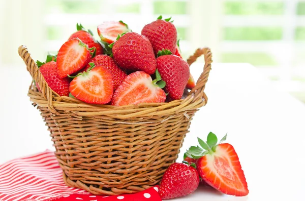 Strawberries in basket — Stok fotoğraf