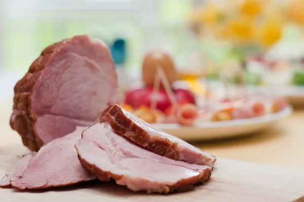 Ham on a dinner table — Stock Photo, Image