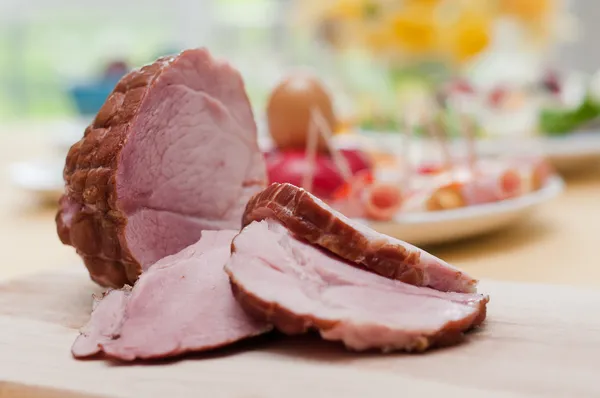 Ham on a dinner table — Stock Photo, Image