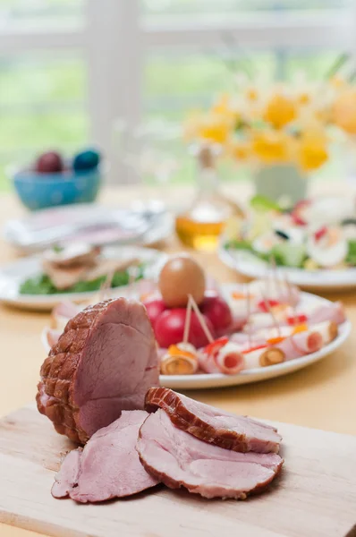 Ham on a dinner table — Stock Photo, Image