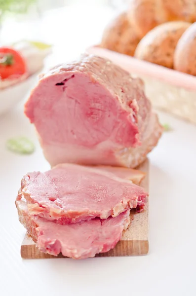 Ham on a dinner table — Stock Photo, Image