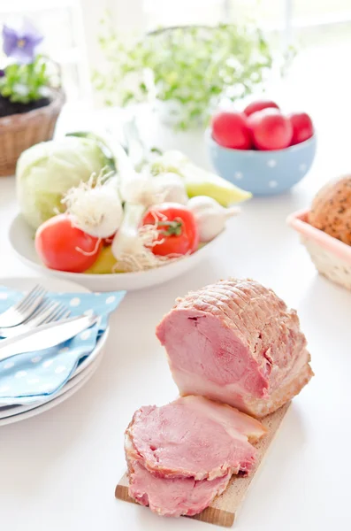 Ham on a dinner table — Stock Photo, Image