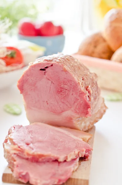 Ham on a dinner table — Stock Photo, Image