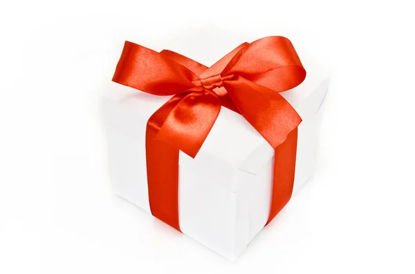 White gift box with red ribbon Stock Image