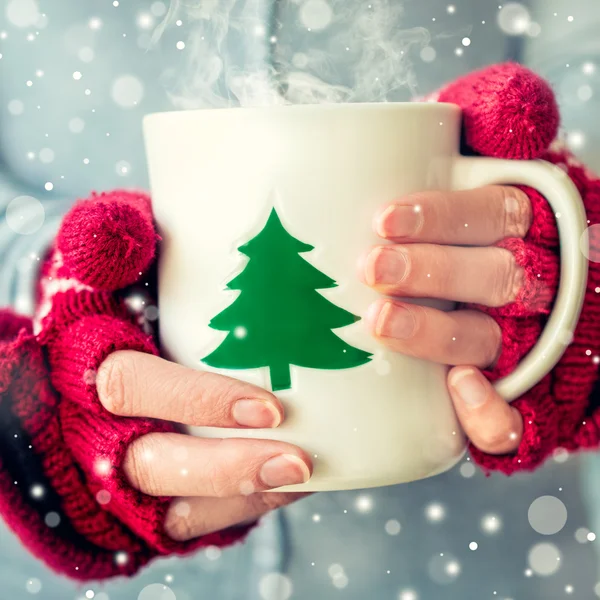 Woman holding tea cup — Stock Photo, Image