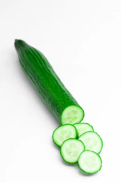 Cucumber slices isolated over white background — Stock Photo, Image