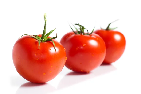 Tomates rouges isolées sur fond blanc — Photo