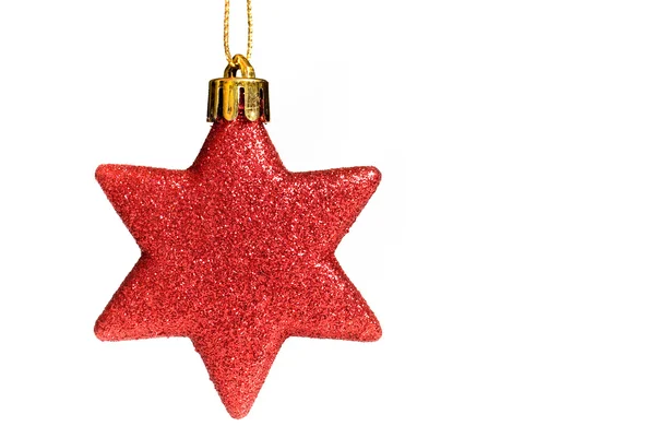 Estrella roja de Navidad aislada sobre un fondo blanco Imagen de stock
