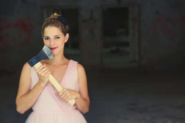 Cute serial killer holding an axe — Stock Photo, Image