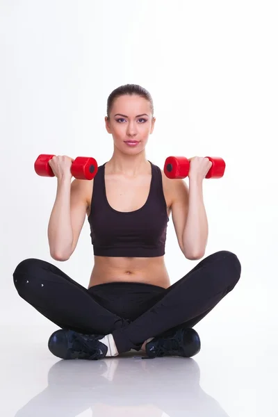 Mujer con mancuernas — Foto de Stock