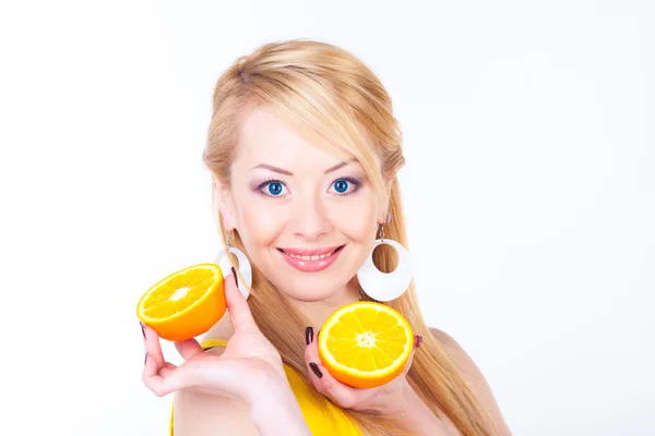 Жінка з апельсинами — стокове фото