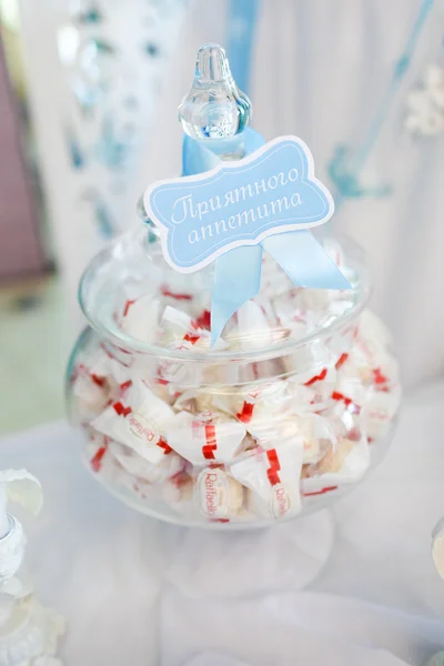 Candy in a glass vase — Stock Photo, Image