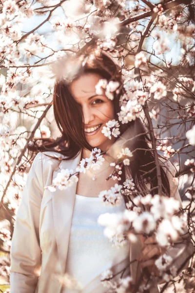 Woman in spring garden — Stock Photo, Image