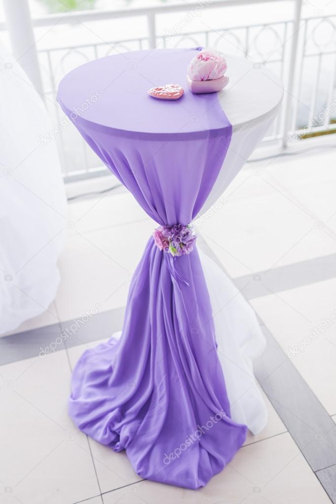 Table decorated with fabric