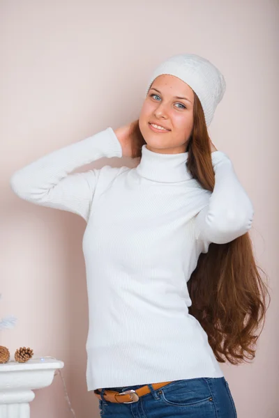 Girl in white hat and sweater — Stock Photo, Image