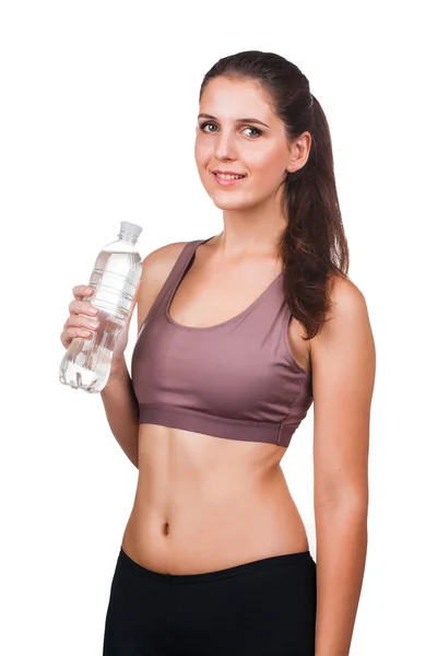 Mujer con botella de agua sobre blanco — Foto de Stock