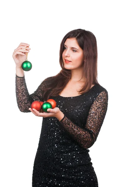 Souriante fille avec des boules de Noël — Photo