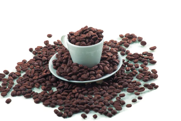 Cup on coffee beans — Stock Photo, Image